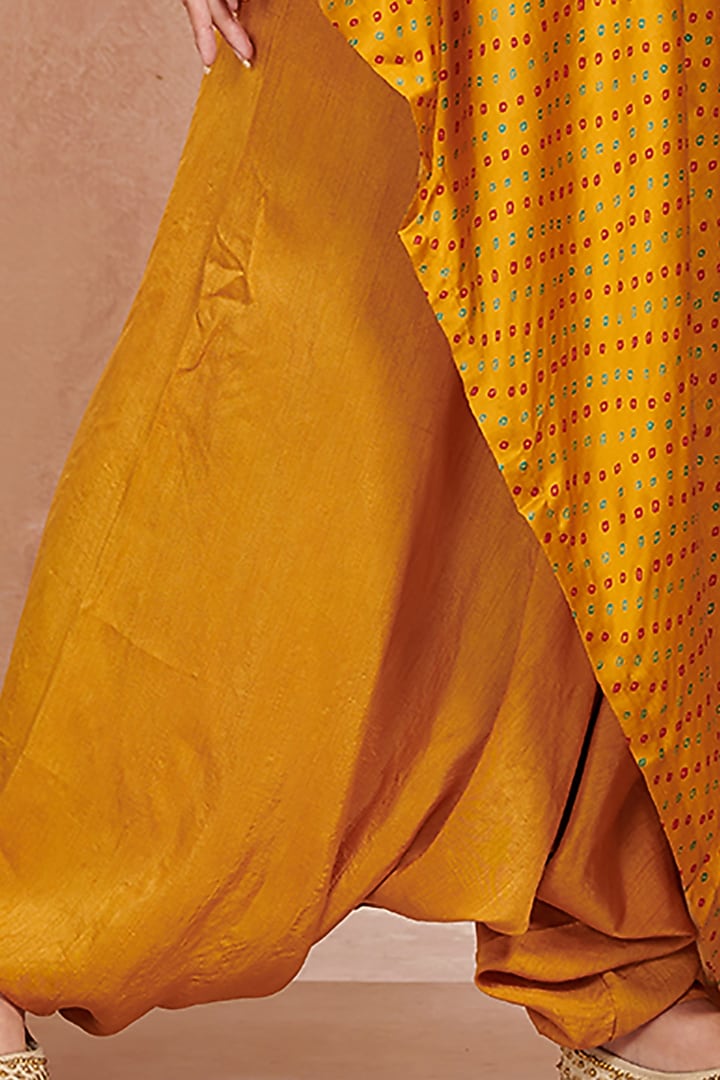 Mustard Printed Jumpsuit With Attached Drape by Onaya at Pernia's Pop Up Shop