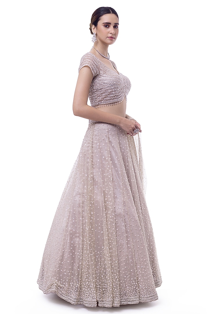 Off-White Net Embellished Wedding Lehenga Set by Onaya at Pernia's Pop Up Shop