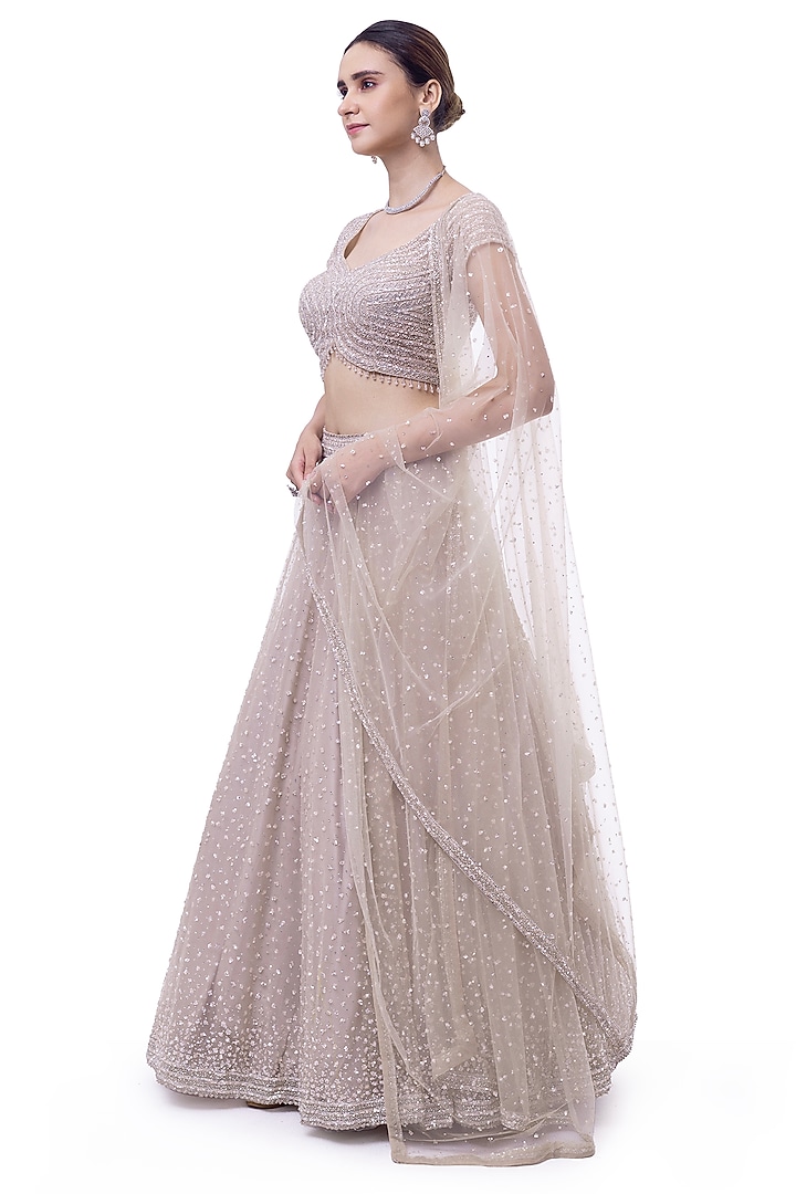 Off-White Net Embellished Wedding Lehenga Set by Onaya at Pernia's Pop Up Shop