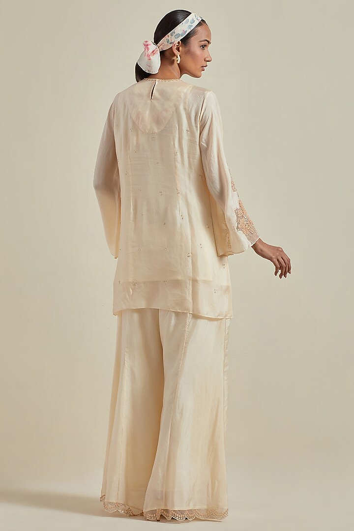 Ecru Viscose Silk Floral Hand Embroidered Gharara Set by One not two at Pernia's Pop Up Shop