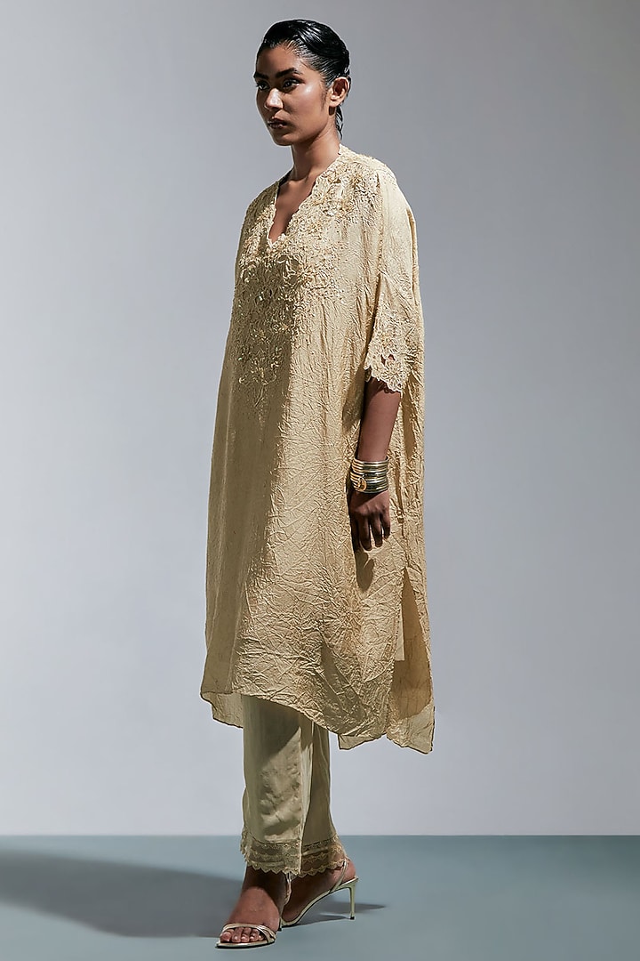 Shell-Colored Silk Floral Thread Embroidered Kurta Set by One not two at Pernia's Pop Up Shop