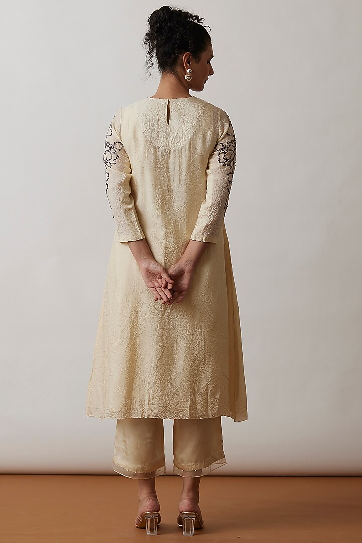 Ivory Viscose Silk Embroidered Kurta Set by One not two at Pernia's Pop Up Shop