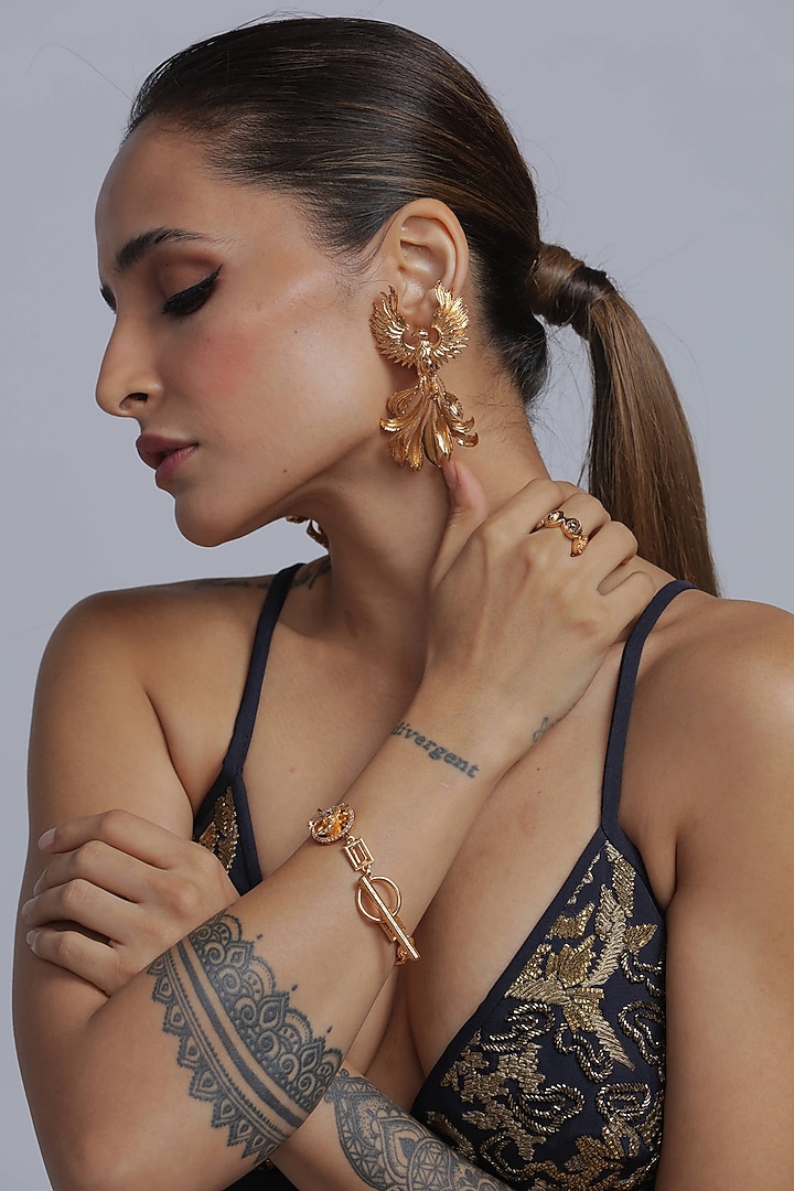 Gold Finish Brass Dangler Earrings by Opalina at Pernia's Pop Up Shop