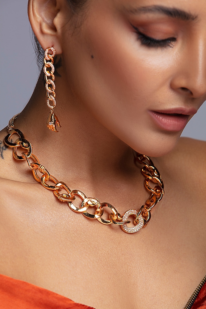 Gold Finish 3D Hand Motif & Zircons Earrings by Opalina at Pernia's Pop Up Shop