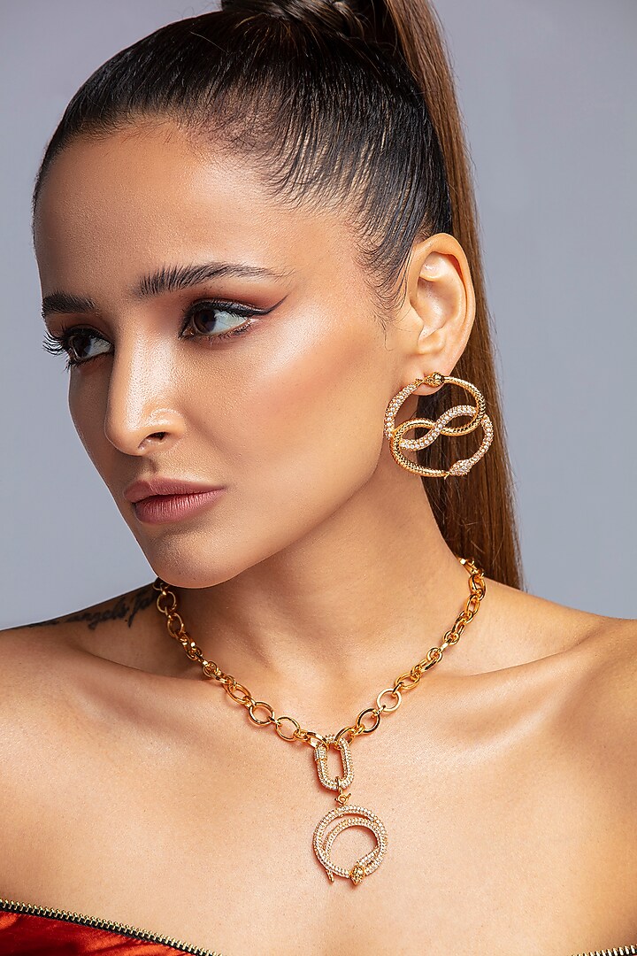 Gold Finish Textured Snake Earrings by Opalina at Pernia's Pop Up Shop