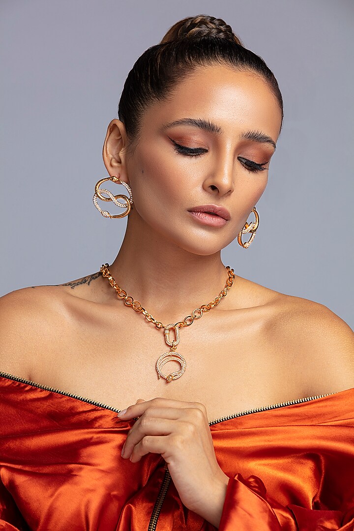 Gold Finish Handcrafted Snake Symbol Necklace by Opalina at Pernia's Pop Up Shop