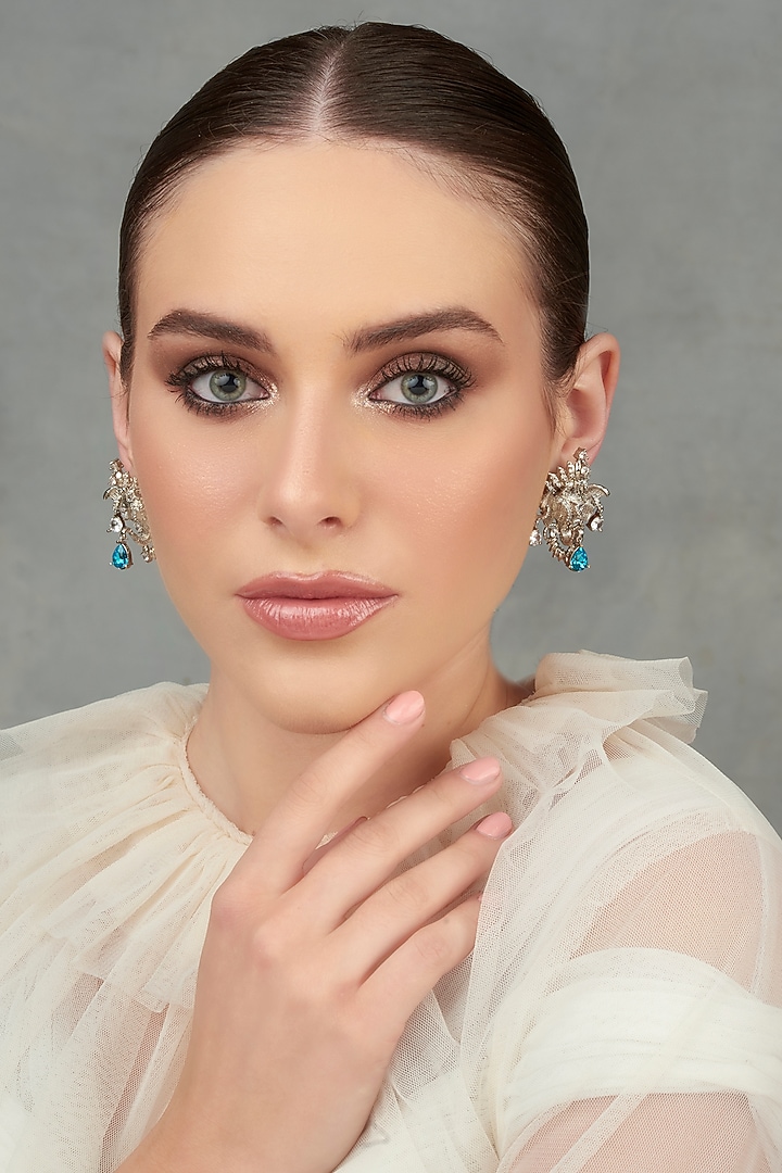 White Plated Swarovski Stud Earrings by Opalina at Pernia's Pop Up Shop
