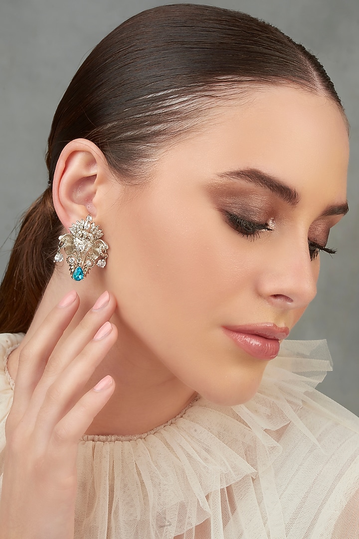 White Plated Swarovski Stud Earrings by Opalina at Pernia's Pop Up Shop