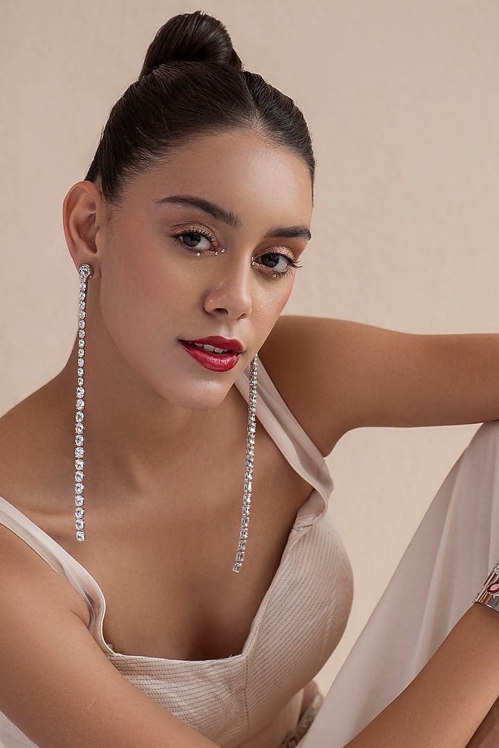 White Finish Swarovski Crystal Dangler Earrings In Sterling Silver by Opalina at Pernia's Pop Up Shop