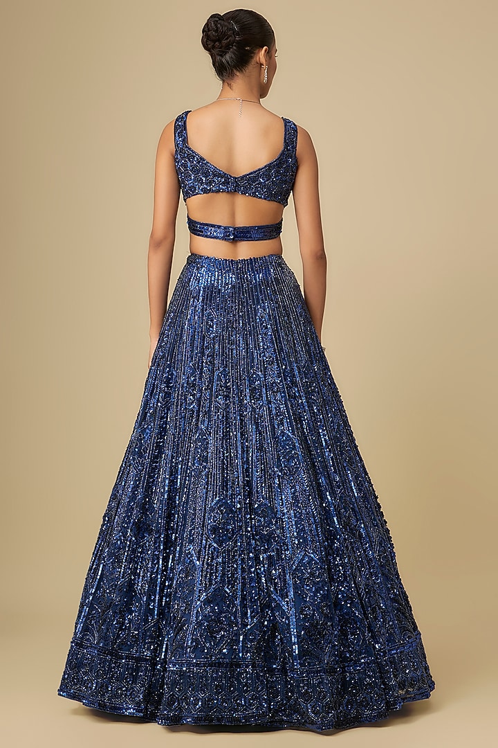 Deep Metallic Navy Blue Net Hand Embroidered Bridal Lehenga Set by OPUS ATELIER at Pernia's Pop Up Shop