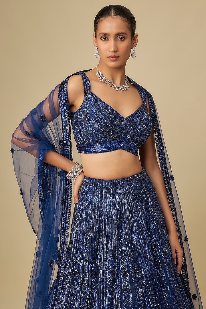 Deep Metallic Navy Blue Net Hand Embroidered Bridal Lehenga Set by OPUS ATELIER at Pernia's Pop Up Shop