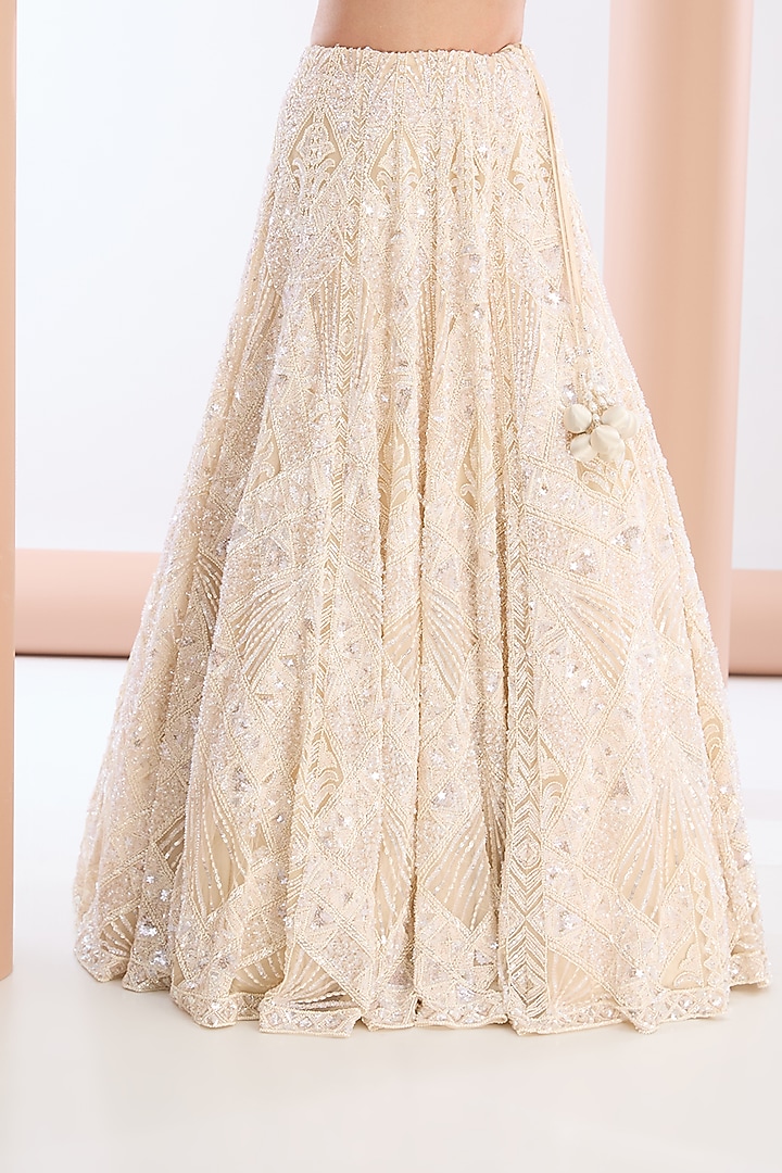 Ivory Tulle Net & Satin Sequins Embellished Bridal Lehenga Set by OPUS ATELIER at Pernia's Pop Up Shop