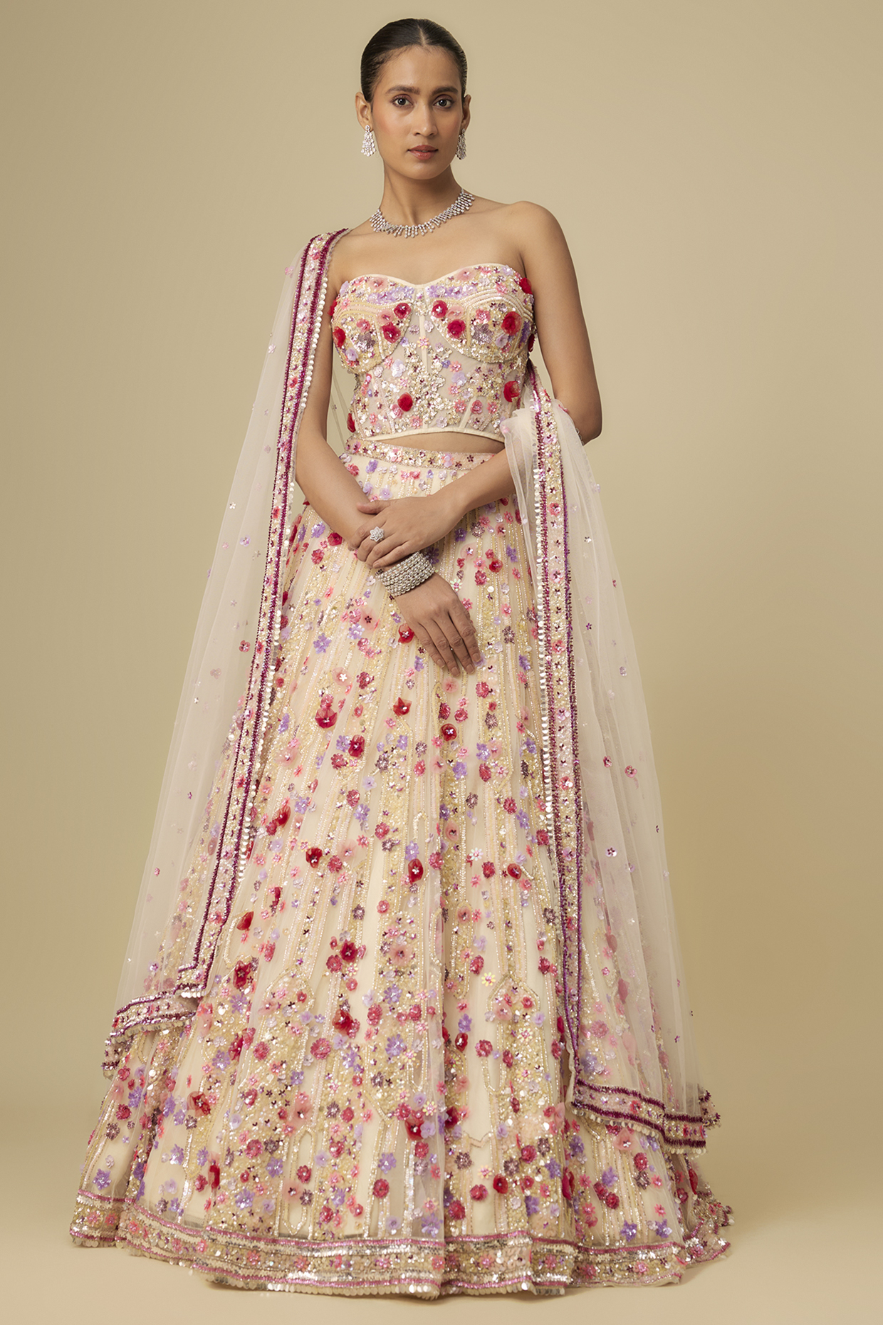 Ivory & Multi-Colored Net Hand Embroidered Bridal Lehenga Set by OPUS ATELIER at Pernia's Pop Up Shop