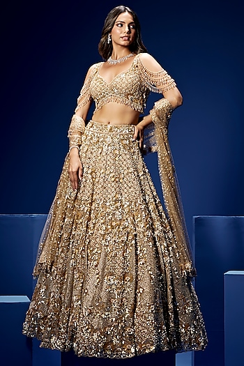Gold Tulle & Satin Hand Embroidered Bridal Lehenga Set by OPUS ATELIER at Pernia's Pop Up Shop