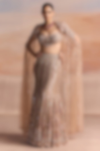 Peach & Silver Net Sequin Embellished Fish-Cut Bridal Lehenga Set by OPUS ATELIER at Pernia's Pop Up Shop
