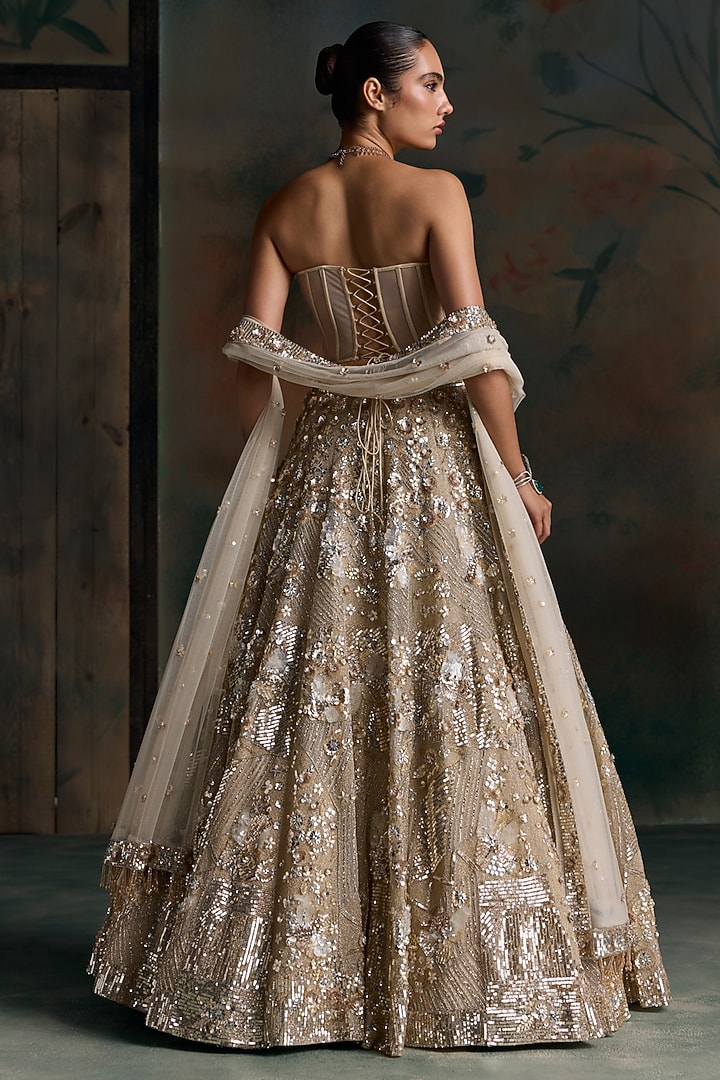 Champagne Gold Net Embroidered Bridal Bridal Lehenga Set by OPUS ATELIER at Pernia's Pop Up Shop
