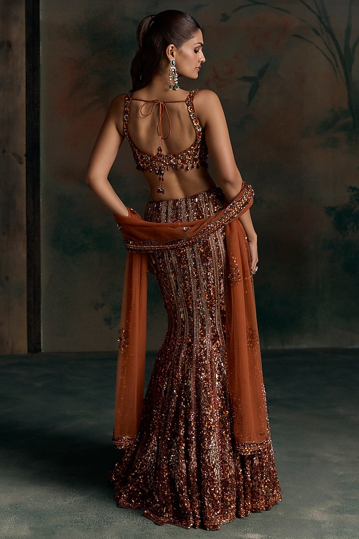 Burnt Orange Net Crystal Embellished Fish-Cut Bridal Bridal Lehenga Set by OPUS ATELIER at Pernia's Pop Up Shop