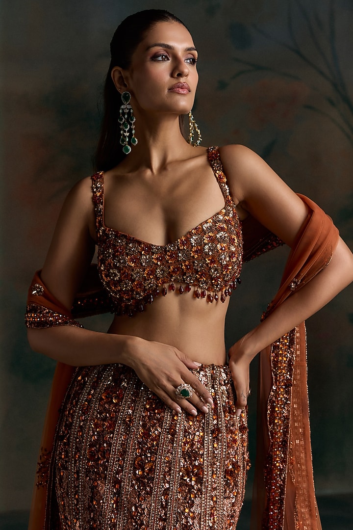Burnt Orange Net Crystal Embellished Fish-Cut Bridal Bridal Lehenga Set by OPUS ATELIER at Pernia's Pop Up Shop