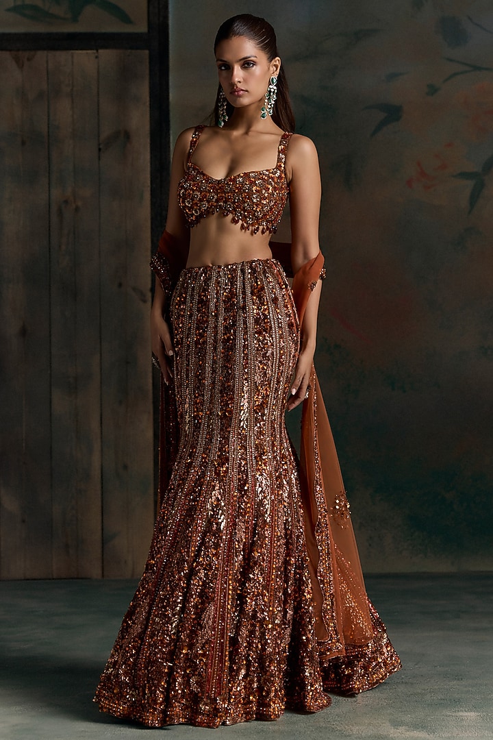 Burnt Orange Net Crystal Embellished Fish-Cut Bridal Bridal Lehenga Set by OPUS ATELIER at Pernia's Pop Up Shop