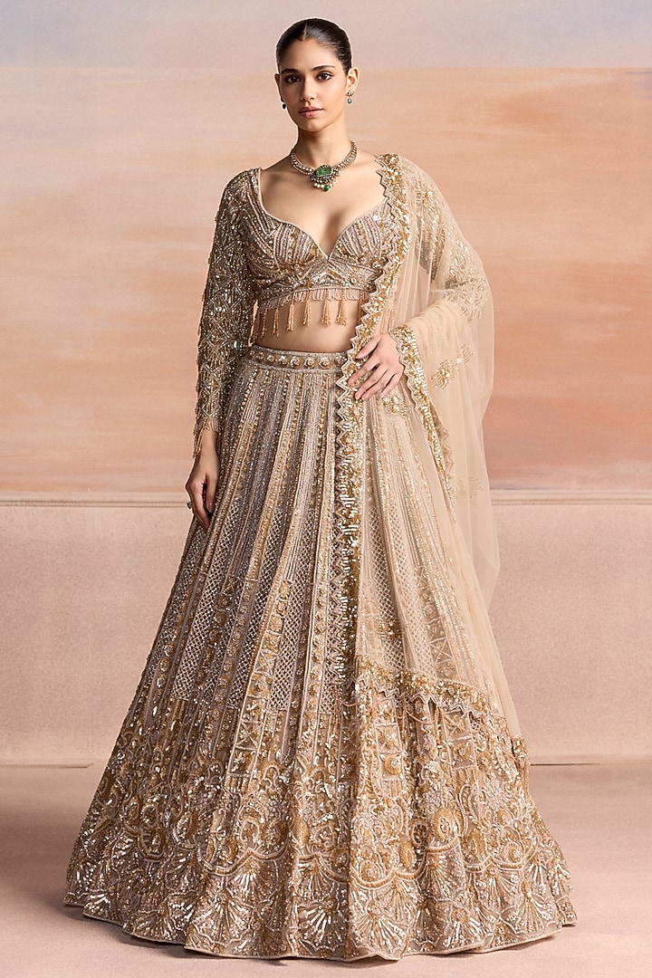 Gold Net Bead Hand Embroidered Bridal Bridal Lehenga Set by OPUS ATELIER at Pernia's Pop Up Shop