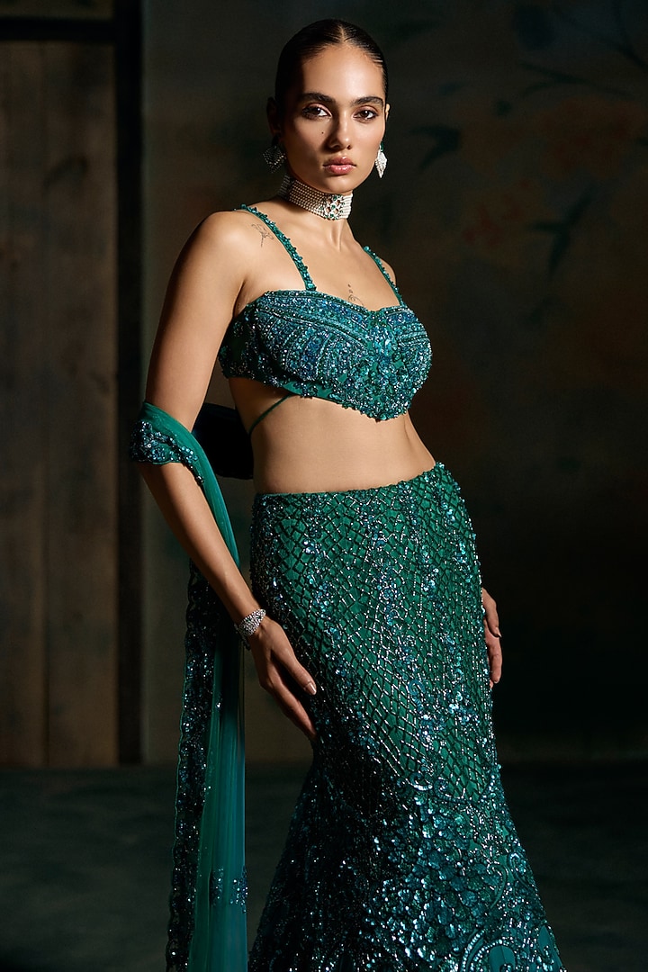 Teal Blue Net Embellished Fish-Cut Bridal Bridal Lehenga Set by OPUS ATELIER at Pernia's Pop Up Shop