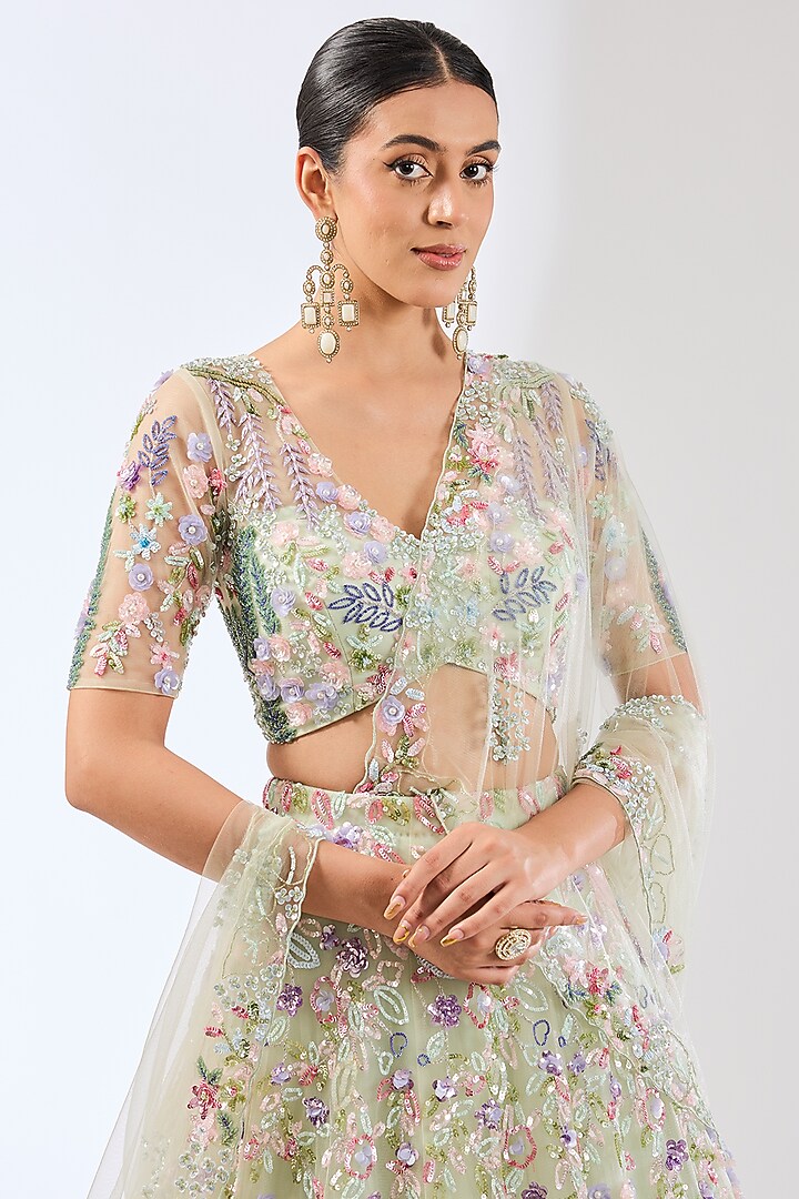 Mint Green Net Sequins & Glass Beads Hand Embroidered Bridal Lehenga Set by OPUS ATELIER at Pernia's Pop Up Shop