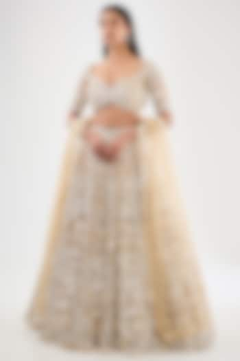 Beige & Ivory Tulle Net Hand Embroidered Bridal Lehenga Set by OPUS ATELIER at Pernia's Pop Up Shop