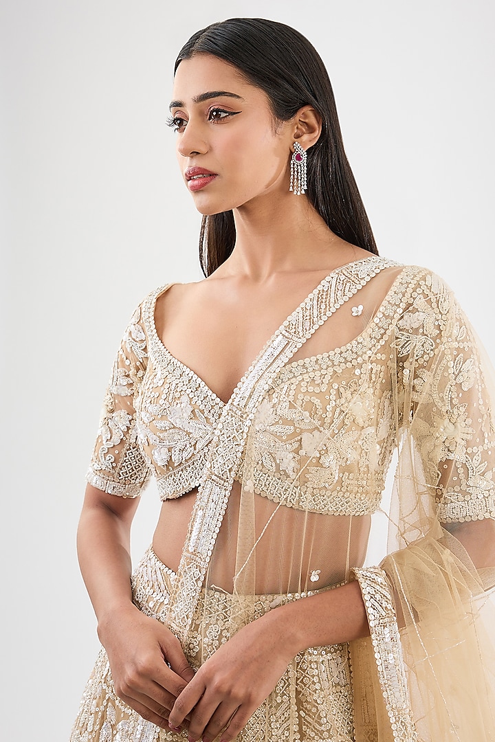 Beige & Ivory Tulle Net Hand Embroidered Bridal Lehenga Set by OPUS ATELIER at Pernia's Pop Up Shop