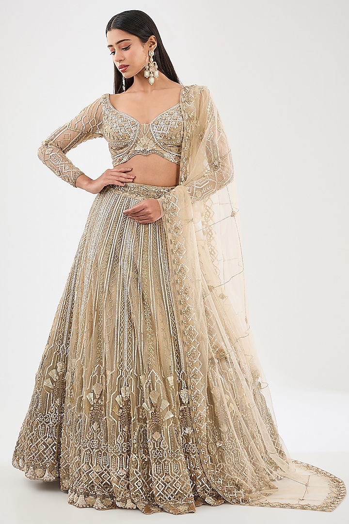 Champagne Gold Tulle Net Hand Embroidered Bridal Lehenga Set by OPUS ATELIER at Pernia's Pop Up Shop