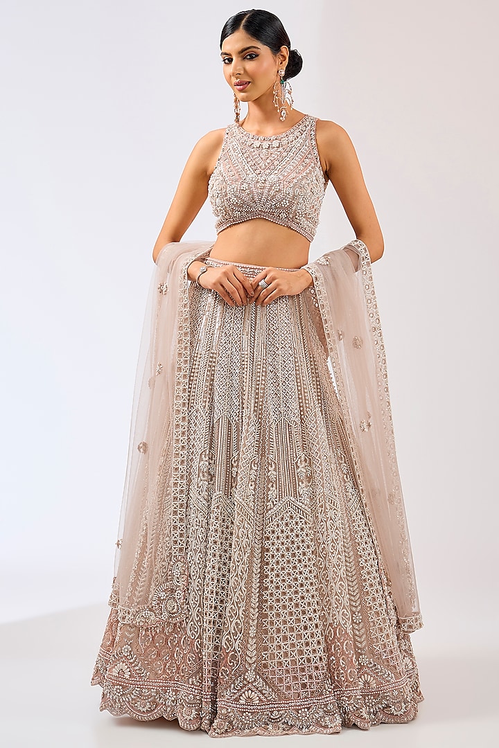 Dull Pink Ombre Tulle Net Hand Embroidered Bridal Lehenga Set by OPUS ATELIER at Pernia's Pop Up Shop