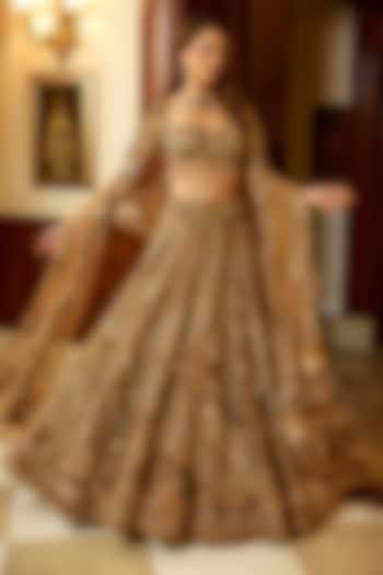 Gold Tulle Net & Satin Hand Embroidered Bridal Lehenga Set by OPUS ATELIER at Pernia's Pop Up Shop