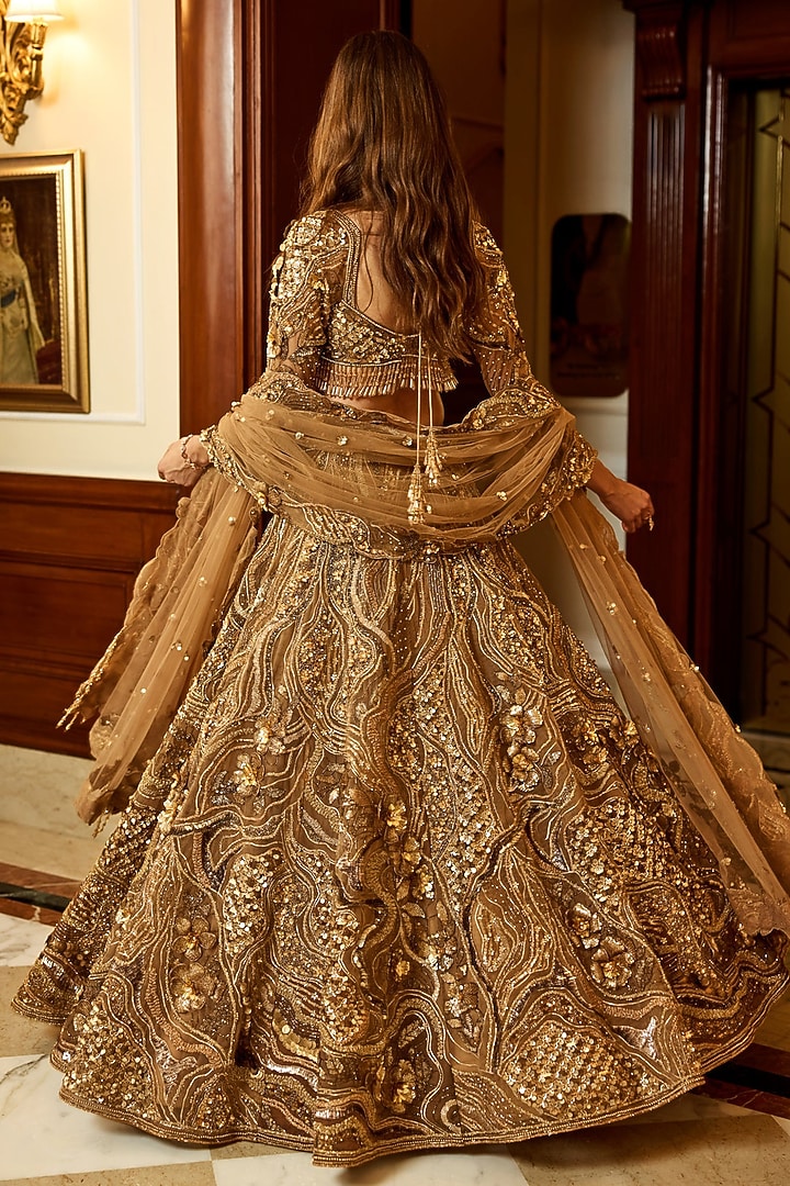 Gold Tulle Net & Satin Hand Embroidered Bridal Lehenga Set by OPUS ATELIER at Pernia's Pop Up Shop