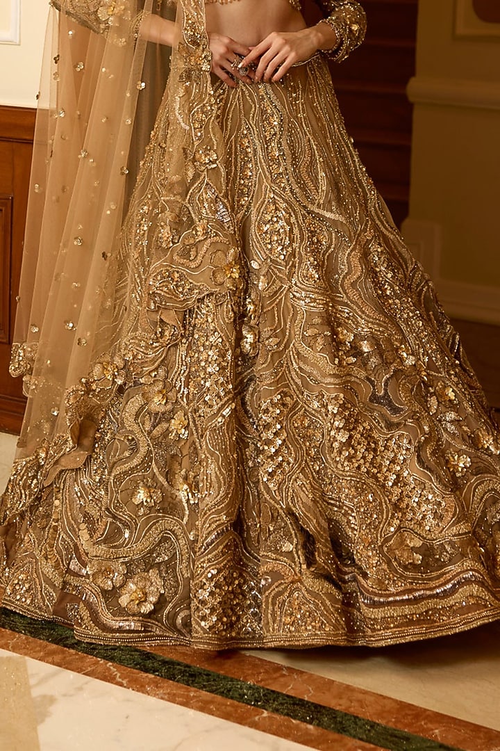 Gold Tulle Net & Satin Hand Embroidered Bridal Lehenga Set by OPUS ATELIER at Pernia's Pop Up Shop