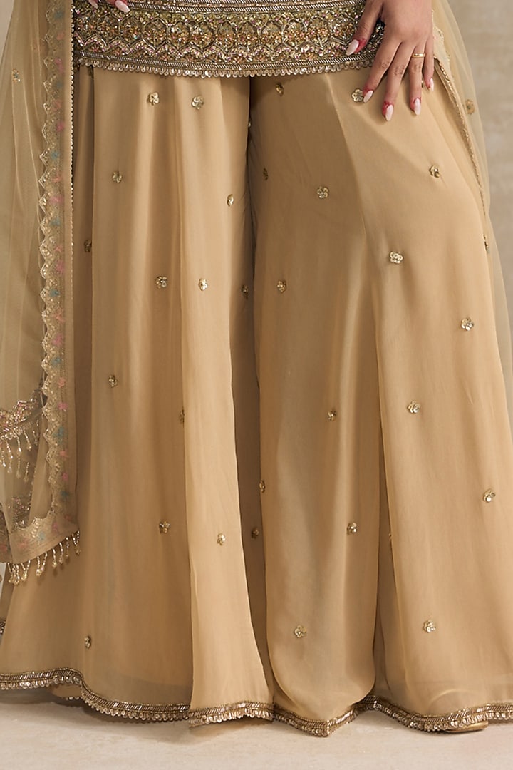 Golden Georgette Crystal Hand Embroidered Bridal Sharara Set by OPUS ATELIER at Pernia's Pop Up Shop