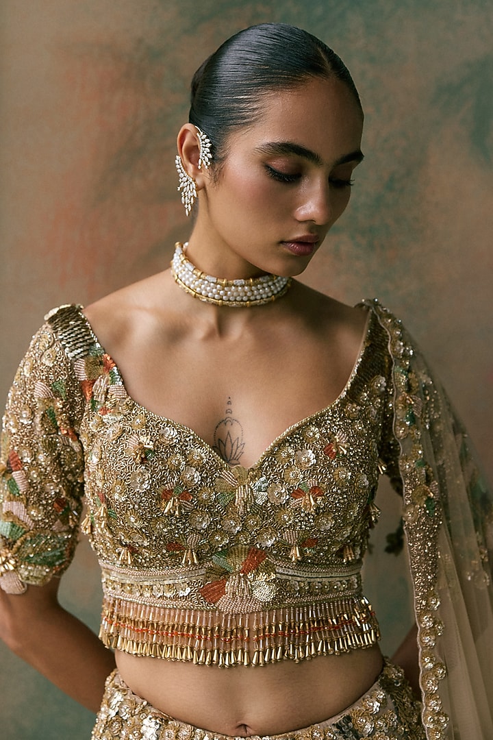 Gold Net 3D Floral Embroidered Bridal Bridal Lehenga Set by OPUS ATELIER at Pernia's Pop Up Shop