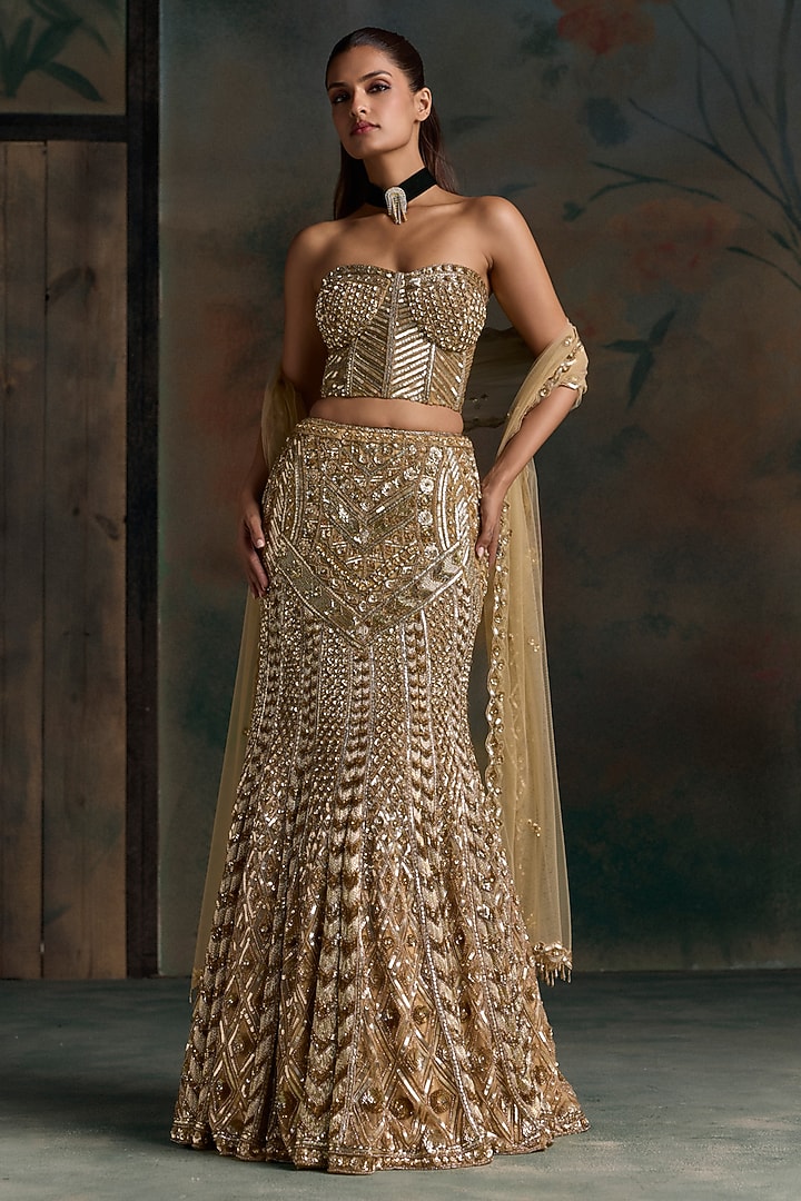 Gold Net Embroidered Fish-Cut Bridal Bridal Lehenga Set by OPUS ATELIER at Pernia's Pop Up Shop