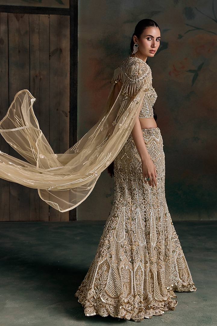Gold Lycra & Net Embroidered Fish-Cut Bridal Jacket Bridal Lehenga Set by OPUS ATELIER at Pernia's Pop Up Shop