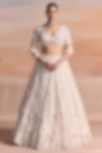 Ivory Net Sequin Embroidered Bridal Bridal Lehenga Set by OPUS ATELIER at Pernia's Pop Up Shop