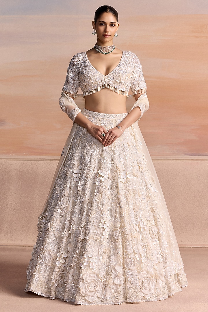 Ivory Net Sequin Embroidered Bridal Bridal Lehenga Set by OPUS ATELIER at Pernia's Pop Up Shop