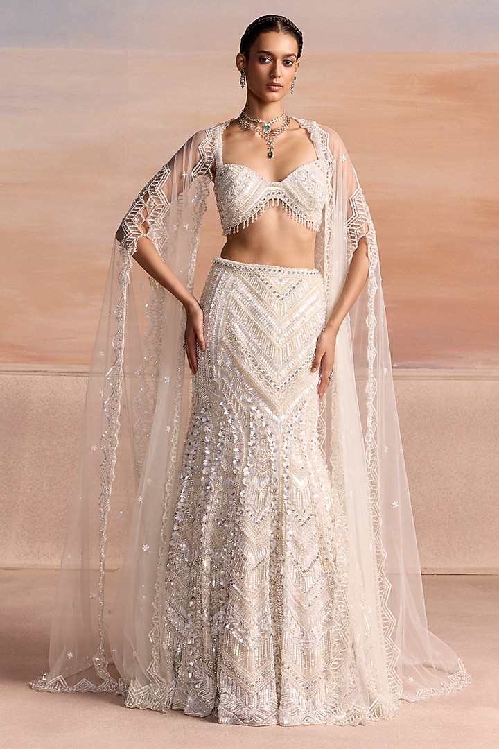 Ivory Ombre Net Sequin Embellished Fish-Cut Bridal Bridal Lehenga Set by OPUS ATELIER at Pernia's Pop Up Shop