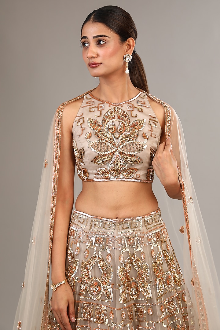 Grey Gold Tulle Net Sequins & Motif Embroidered Bridal Lehenga Set by OPUS ATELIER at Pernia's Pop Up Shop