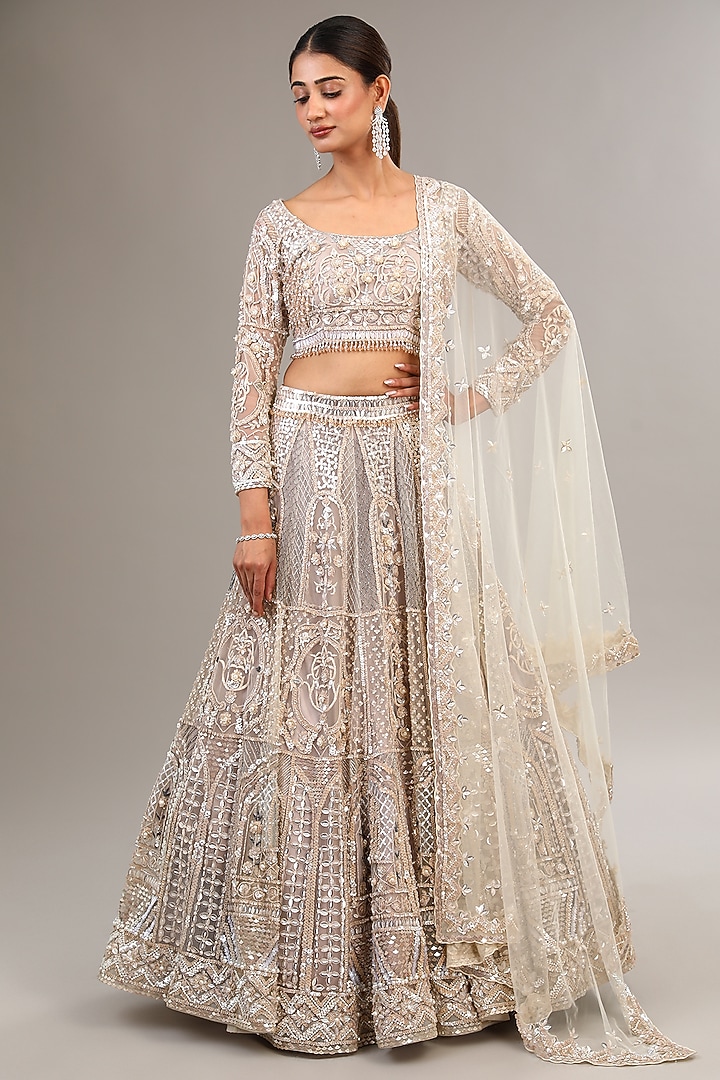 Ivory Tulle Net Sequins & Crystal Embroidered Bridal Lehenga Set by OPUS ATELIER at Pernia's Pop Up Shop