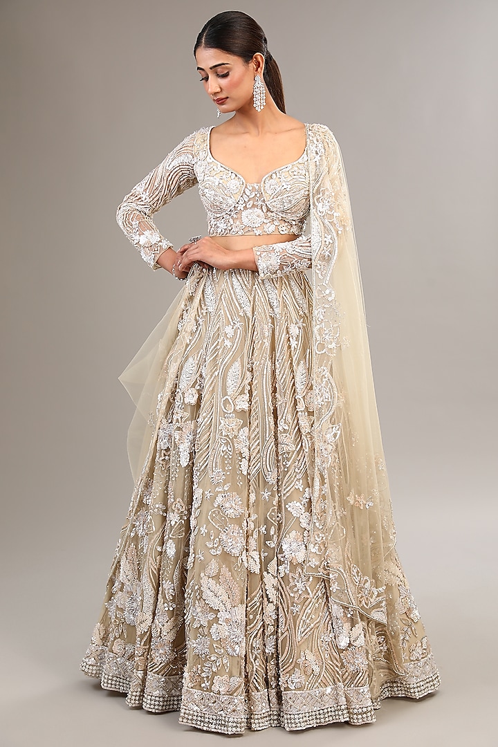 Ivory Tulle Net Sequins & Pearl Embellished Bridal Lehenga Set by OPUS ATELIER at Pernia's Pop Up Shop