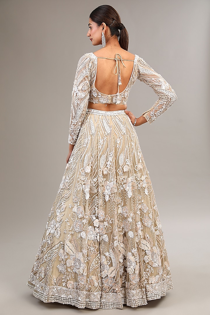 Ivory Tulle Net Sequins & Pearl Embellished Bridal Lehenga Set by OPUS ATELIER at Pernia's Pop Up Shop
