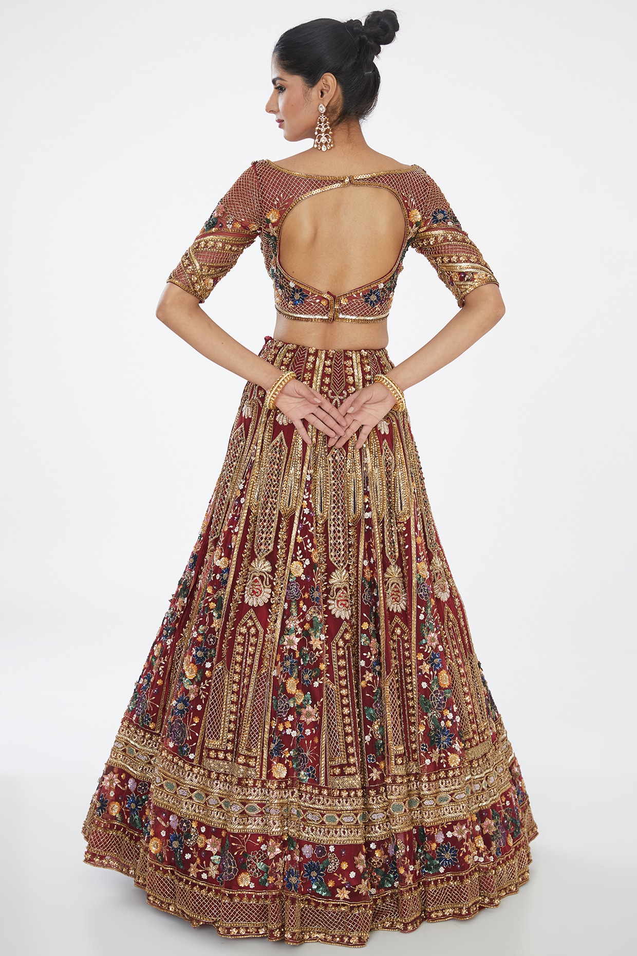 Maroon & Gold Heavy Gold Embroidered Maroon Bridal Lehenga by HER CLOSET  for rent online | FLYROBE