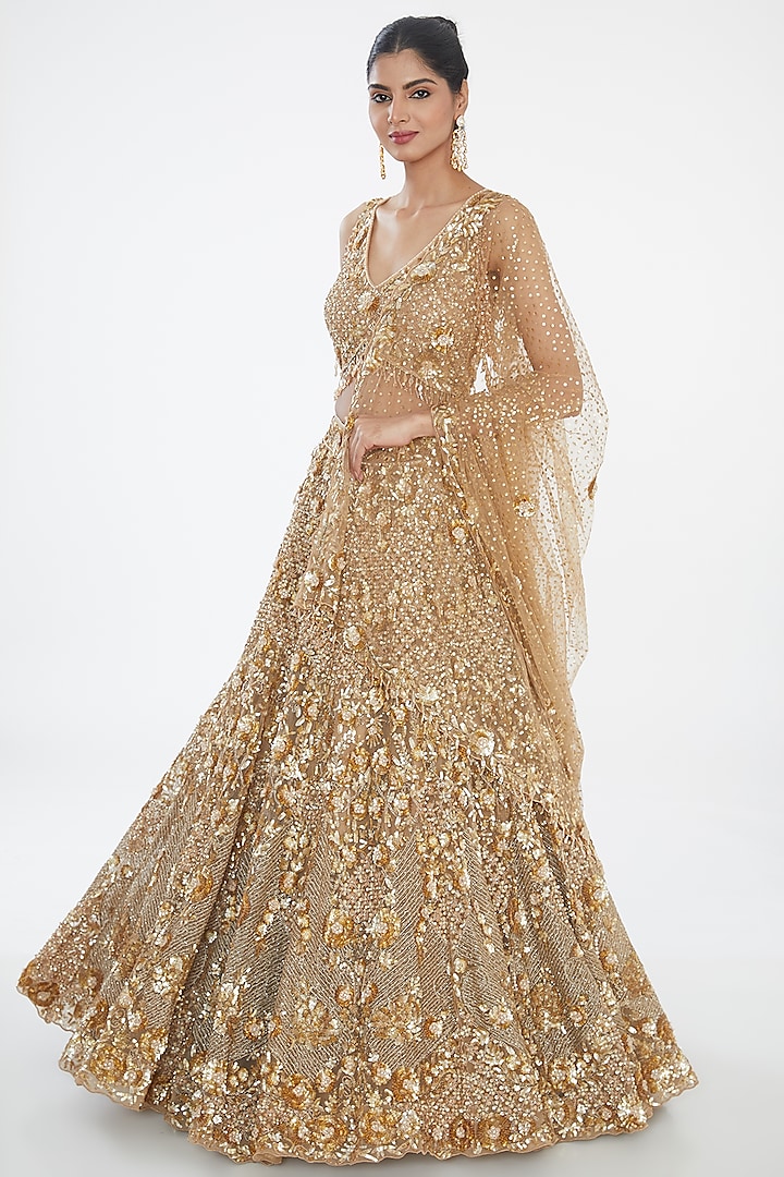 Golden Viscose Satin Sequins Hand Embroidered Lehenga Set by OPUS ATELIER