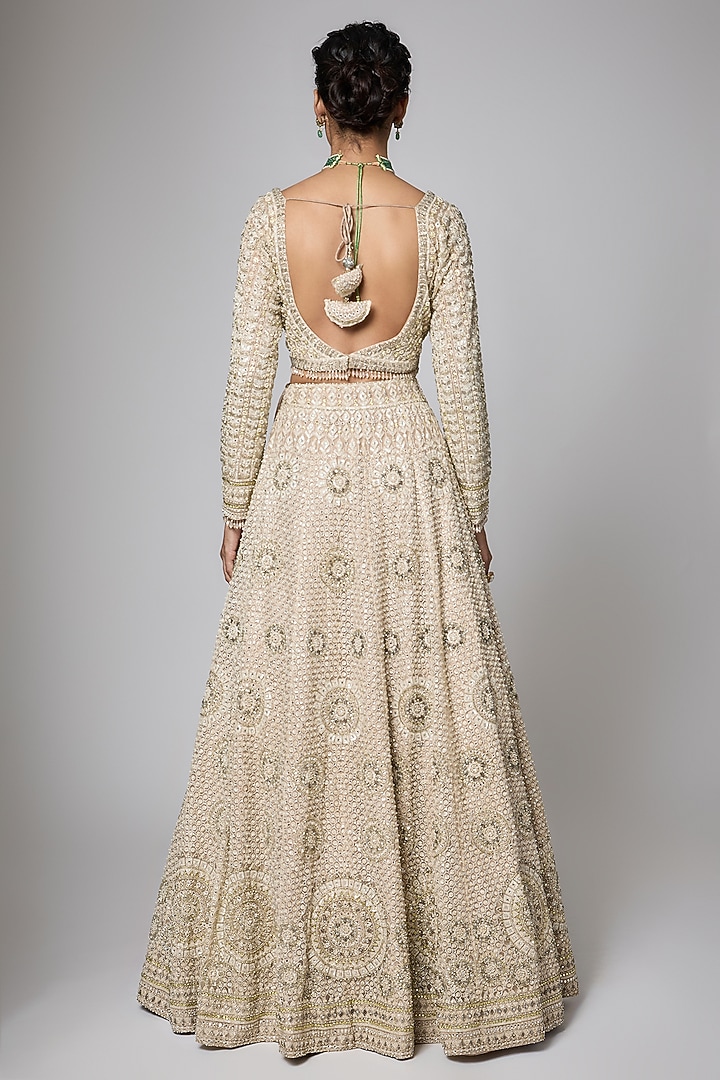 Peach Silk Brocade Zari Motif Work Bridal Lehenga Set by ORGANZZA at Pernia's Pop Up Shop