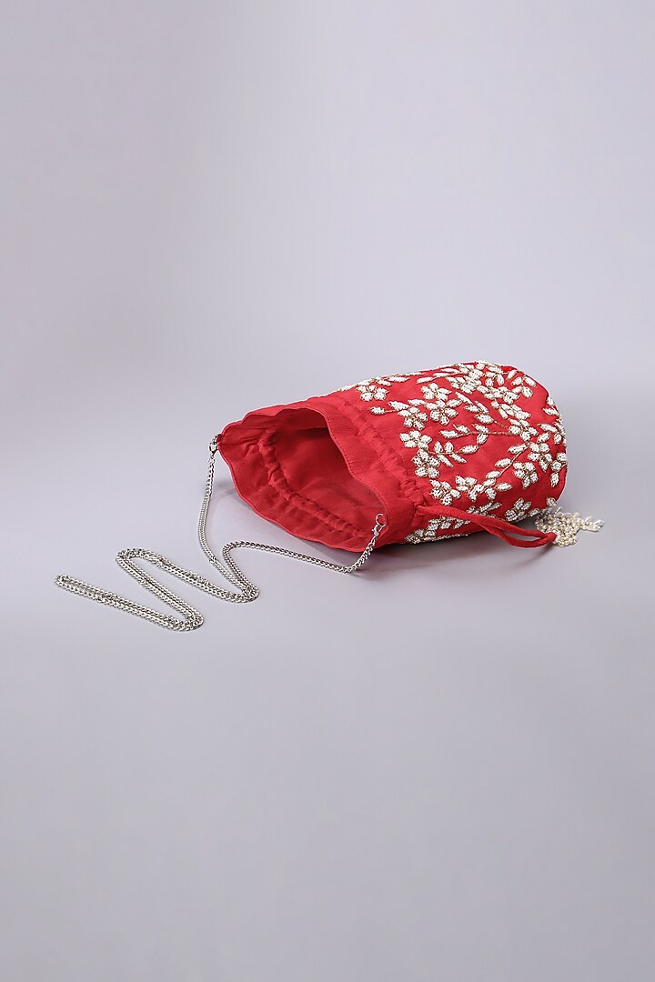 Red Pearl Embellished Potli by Ornatte at Pernia's Pop Up Shop