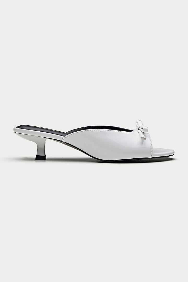 White Genuine Leather Bow Mules by Oroh at Pernia's Pop Up Shop