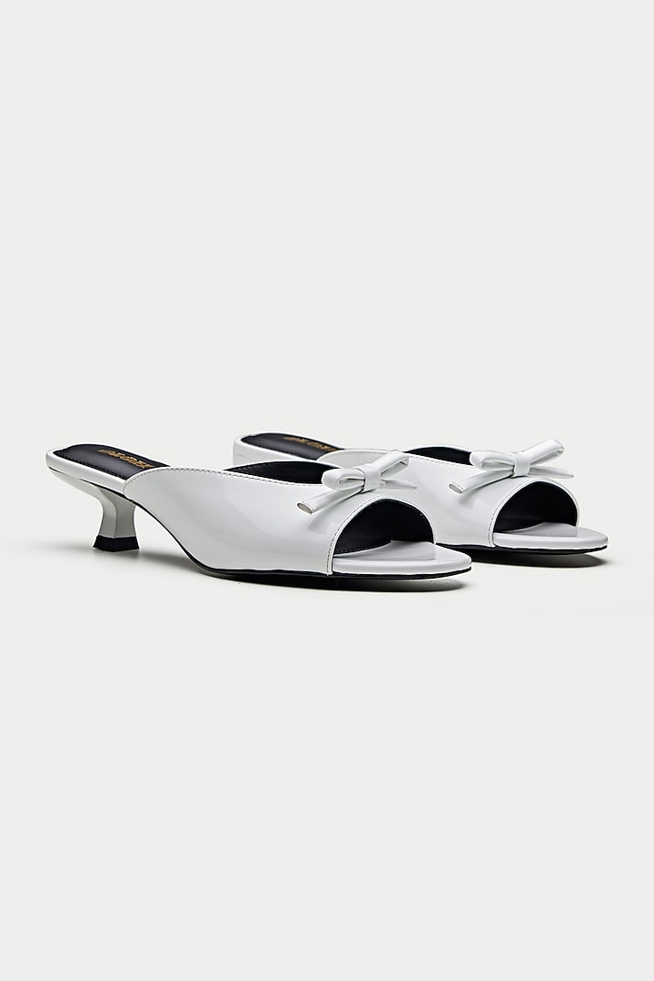 White Genuine Leather Bow Mules by Oroh at Pernia's Pop Up Shop